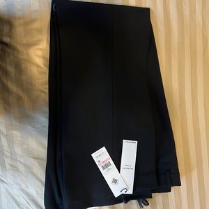 Calvin Klein size 10 slacks brand new.   Tags on.  Perfect condition.